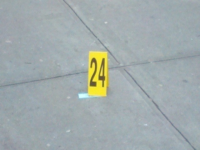 A shell casing marking in the wake of a shooting on Feb. 27, 2012, in which a suspect and PSA 4 cops had a gun battle on the Lower East Side.