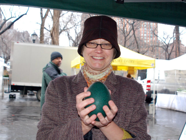 Architect Victoria Rospond, 50, picks up an emu egg to poach for a work luncheon.
