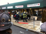 SUV Crashes Into Queens Stores, Injuring Three
