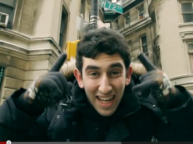 Collegiate grad Doug Gleicher, 19, in a still from the music video for 