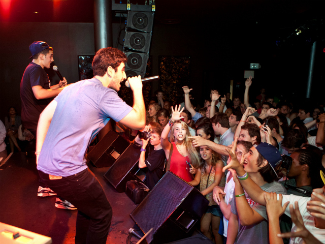 Jesse Finkelstein and Doug Gleicher, Collegiate grads, performing in their hip-hop group Upper West.