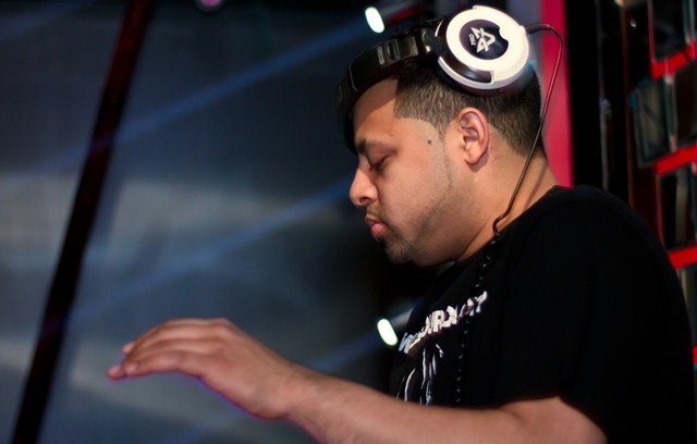 A DJ spins old time favorites at Negro Claro.