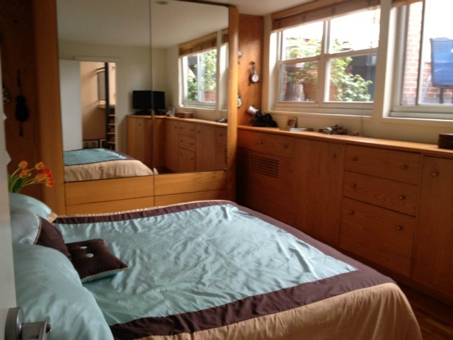 The bedroom at 571 Hudson St., 6D, overlooks the apartment's terrace. 