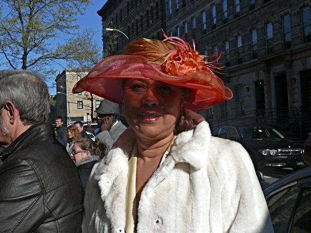 Ruth H. in a tone on tone organza crystalline confection with an unstructured brim.