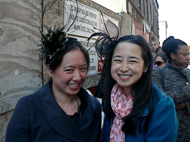 Michelle N. and Julia C. in plume and net fascinators.