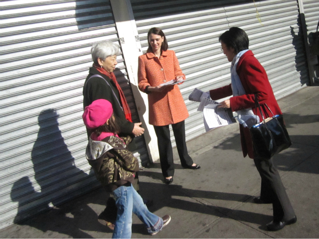 Councilwomen Margaret Chin and Jessica Lappin distribute flyers warning of a groping pattern April 12, 2012. 