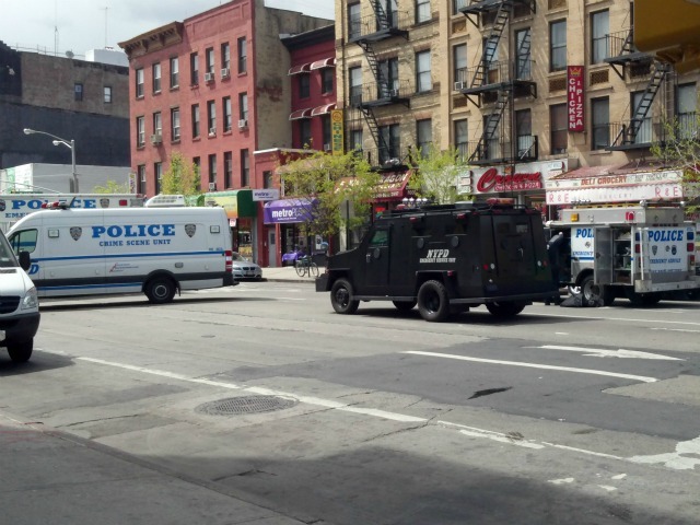 Several police vehicles were on scene at First Avenue and 119th Street on  Thursday, April 12, 2012 in East Harlem. 
