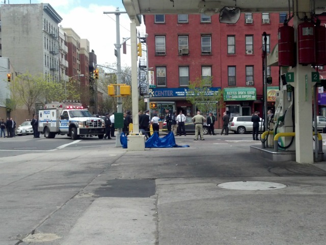 Police shot and killed an armed drugstore robber on Thursday, April 12, 2012 in East Harlem. 