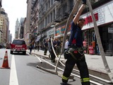 Firefighters Battle Blaze at Shoe Store on Broadway