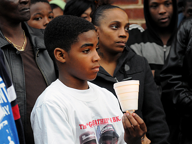 Mourners said they wanted the company that owns the building where Yakim McDaniels died to build a safe play space for their children. 