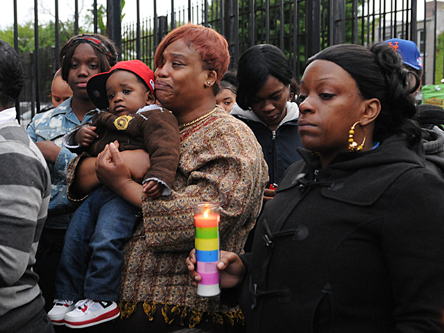 Family and friends mourn the death of Yakim McDaniels on May 7, 2012. 