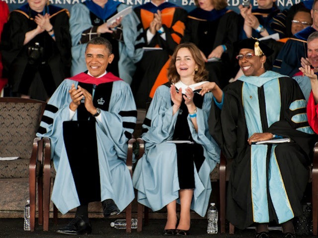 President Obama applauds wearing Columbia blue.