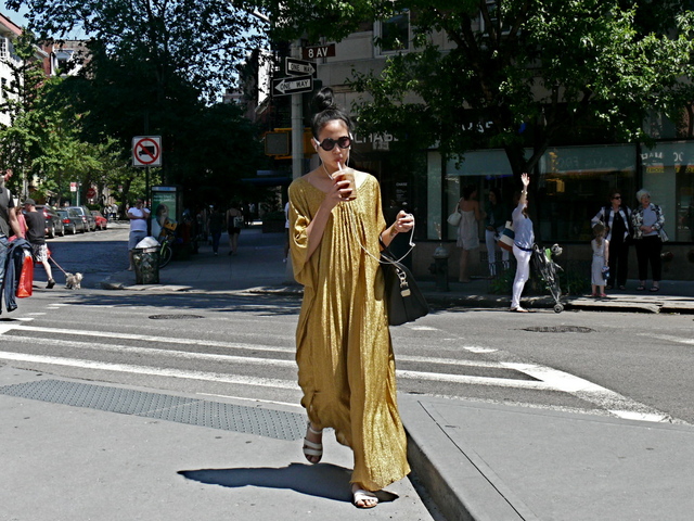 Flowing vintage muted gold pleated Halston style caftan, in the West Village.