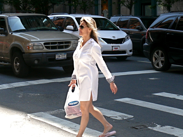 A white cotton shirt-dress with contrast cuff detail is always a good classic crisp sportswear look — in SoHo.