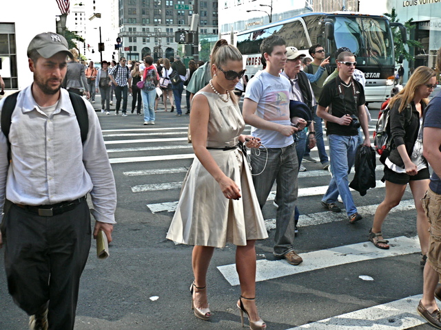 Structured polished cotton dress with a scoop back in matte and shine ivory on Fifth Avenue Midtown. 