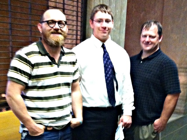 Clayton Baltzer, middle, with his father, Tim Baltzer, right, and uncle Daniel Baltzer, left.