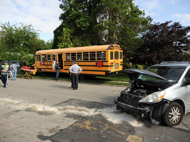 <p>The scene of a school bus and minivan crash in Queens on Tuesday June 5, 2012.</p>
