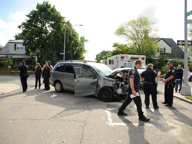 <p>This minivan crashed into a school bus in Queens on Tuesday June 5, 2012.</p>
