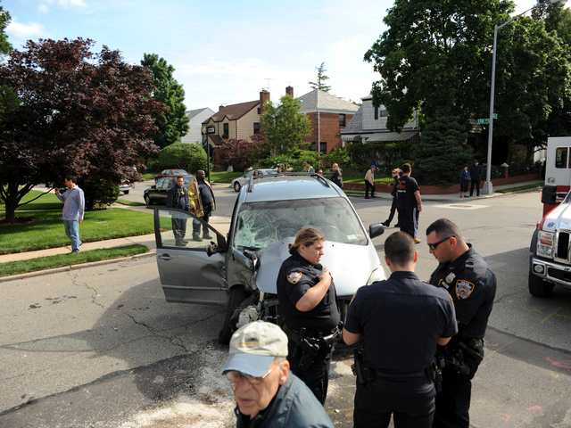 <p>This minivan crashed into a school bus in Queens on Tuesday June 5, 2012.</p>
