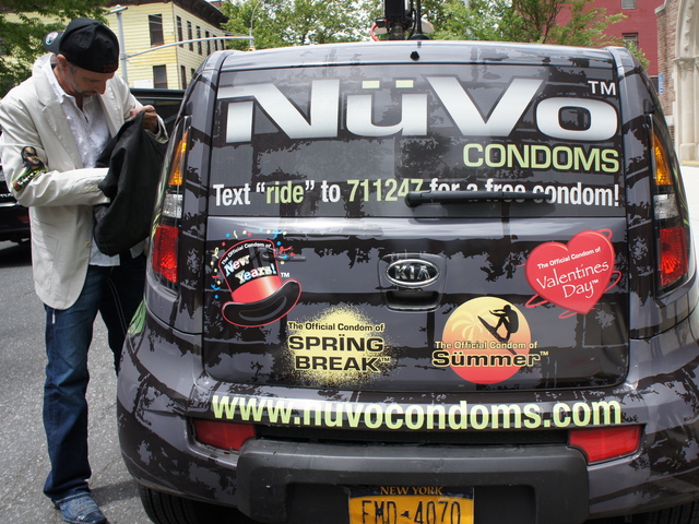 NuVo Condom representative Behn Goldis prepares to lead a safe sex assembly at Bedford Stuyvesant Preparatory High School in Brooklyn Tuesday. The company had initially partnered with principal Darryl Rascoe to give away 500 condoms to students for the school's prom Thursday night, but those plans were scuttled after blowback from the DOE.
