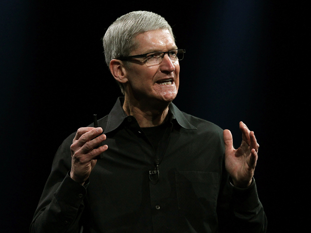 Apple CEO Tim Cook gives the keynote address at the Worldwide Developers Conference in San Francisco, June 11, 2012. 