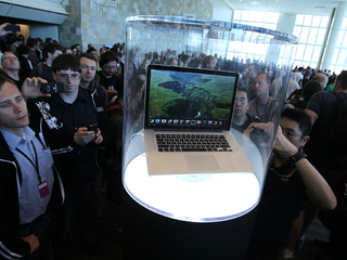 Apple CEO Tim Cook gives the keynote address at the Worldwide Developers Conference in San Francisco, June 11, 2012.
