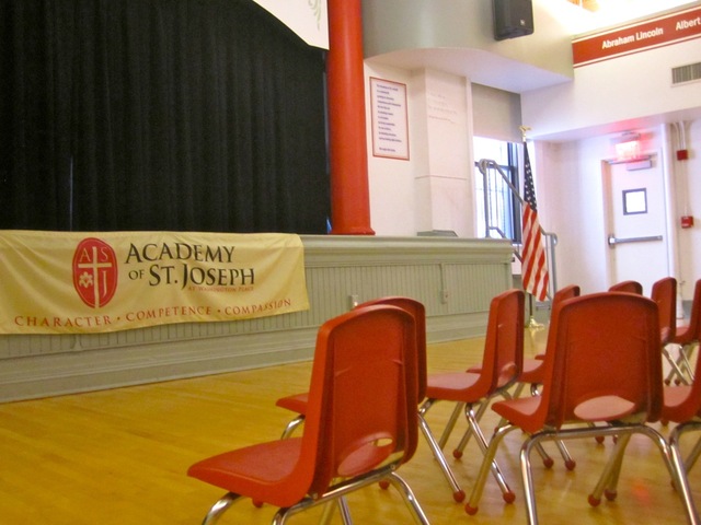 Students at the Academy of St. Joseph meet for a daily morning assembly.