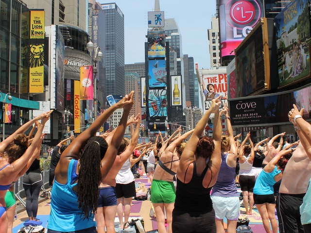 Over 14,000 people turned out for the Bikram Yoga class celebrating the summer solstice on Wed. June 20, 2012.