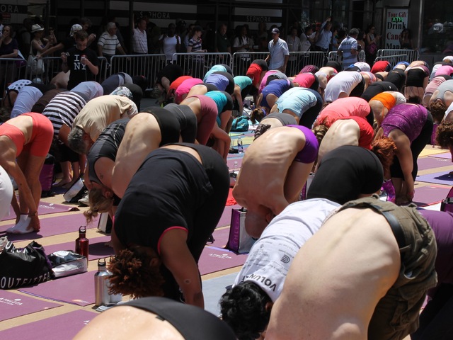 Over 14,000 people turned out for the Bikram Yoga class celebrating the summer solstice on Wed. June 20, 2012.