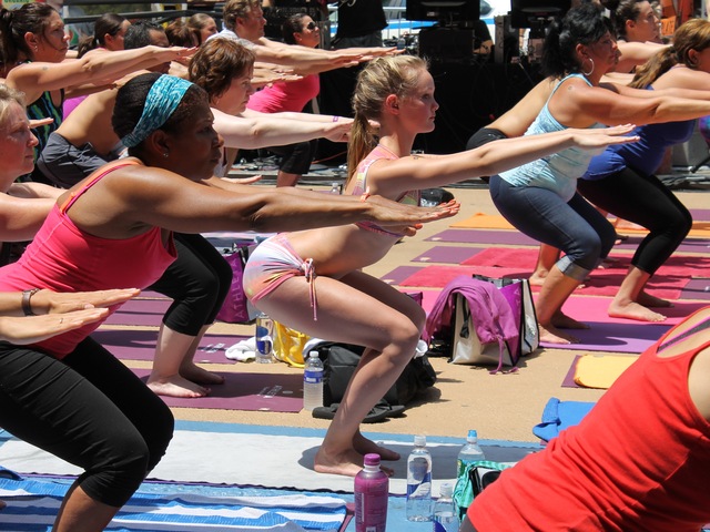 Thousands of yogis turned out for a free Bikram Yoga class in Times Square on June 20, 2012.
