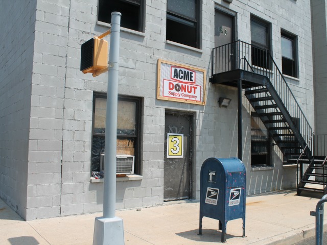 The elaborate set includes everything from fire escapes to storefronts and mail boxes.