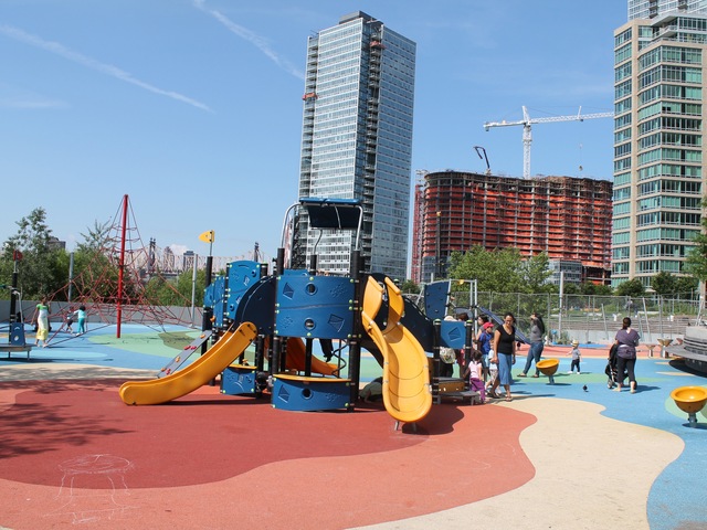The flooring, covering the entire Gantry Plaza State Park Playground, is extremely soft and shock-absorbent.