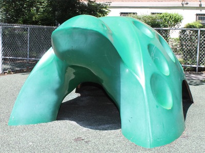 A turtle play sculpture at Queensview Playground.