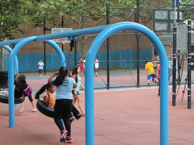 Tire swings at Athens Square playground.