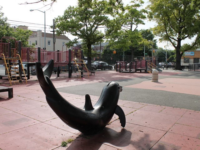 Dolphin animal art at Woodtree playground.