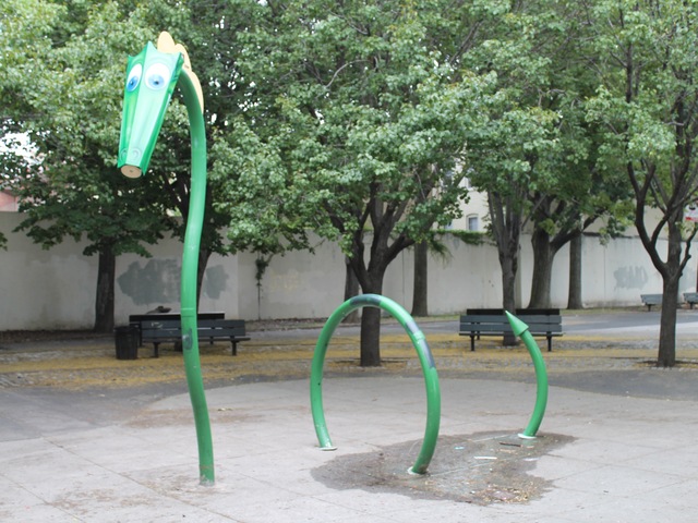 Dragon-shaped sprinklers at Hoyt playground.