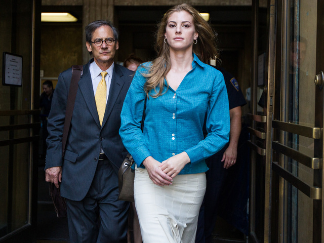 Jaynie Mae Baker leaves Manhattan Supreme Court with her lawyer Robert Gottlieb on June 29th, 2012.