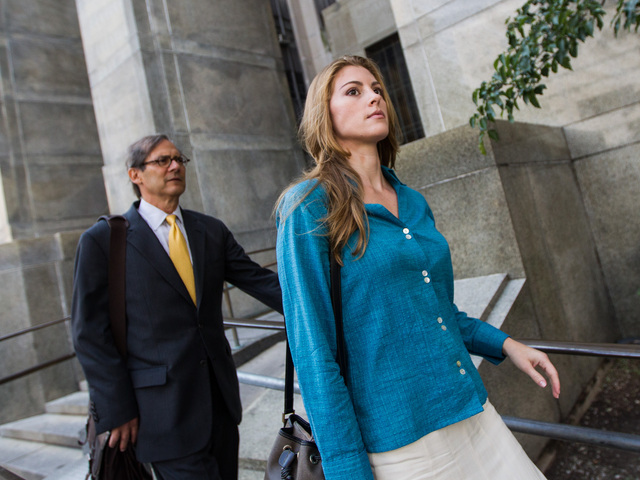 Jaynie Mae Baker leaves Manhattan Supreme Court with her lawyer Robert Gottlieb on June 29th, 2012.
