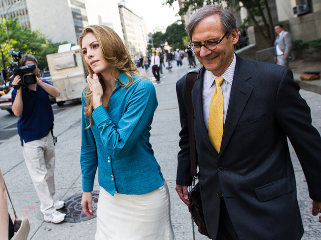 Jaynie Mae Baker leaves Manhattan Supreme Court with her lawyer Robert Gottlieb on June 29th, 2012.