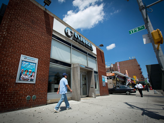 Witnesses at the Astoria Federal Savings Bank on Hillside Avenue between 179th Street and Midland Parkway said the robbery suspect fled the scene with a trail of red smoke