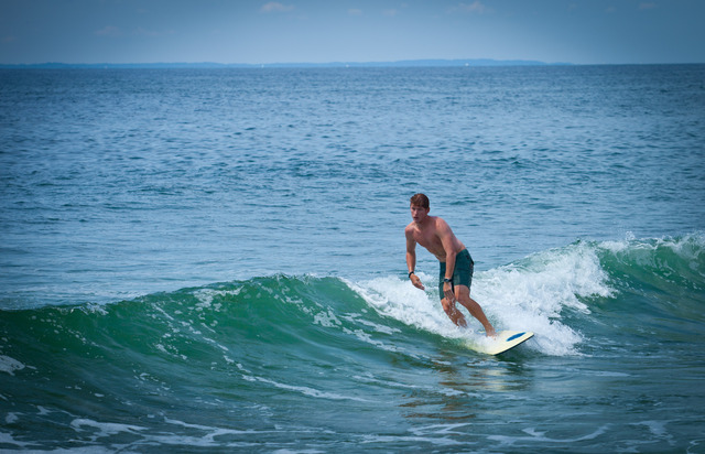 A surfer from California at Rockaway Beach on July 11. 