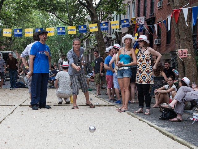 Players enjoy petanque at Bastille Day in Brooklyn on July 15th, 2012.a