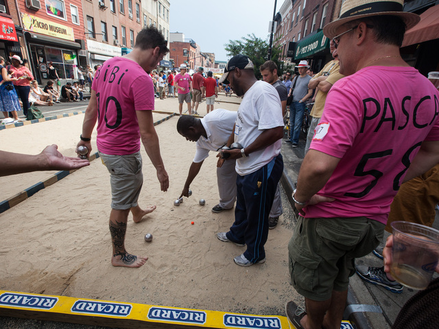 Calls are questioned during a game of petanque at Bastille Day in Brooklyn on July 15th, 2012.