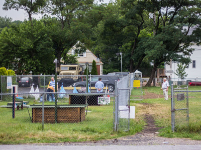 <p>People line up to fill empty bottles of water at the Staten Island spring.</p>
