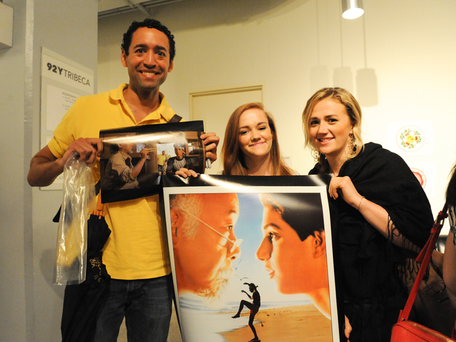 Lucas Mills, 33 (at left), with two friends, came with a still from the film that he Photoshopped a picture of himself in. 