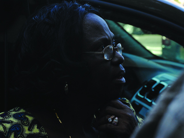 Evelyn Anyaogu, 68, tells reporters about her cousin who was among the five victims in the crash early July 22, 2012. 
