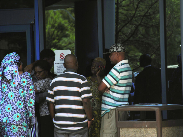 Outside Jamaica Hospital, friends and relatives of the victims consoled one another on July 22, 2012. 