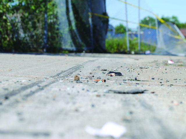 After the vehicle collided with the pillar, it skid about 100 feet, before coming to a rest on its passenger's side on July 22, 2012. 