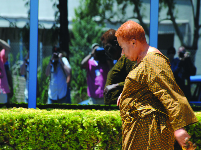 Outside Jamaica Hospital, victims' friends mourned and consoled one another on July 22, 2012. 