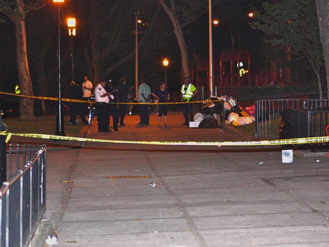 Yellow police tape ringed the scene of the shooting Sunday, July 22, 2012.